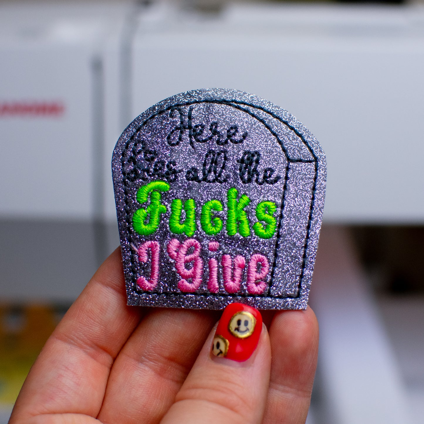 Here Lies All the Feltie Embroidery Design