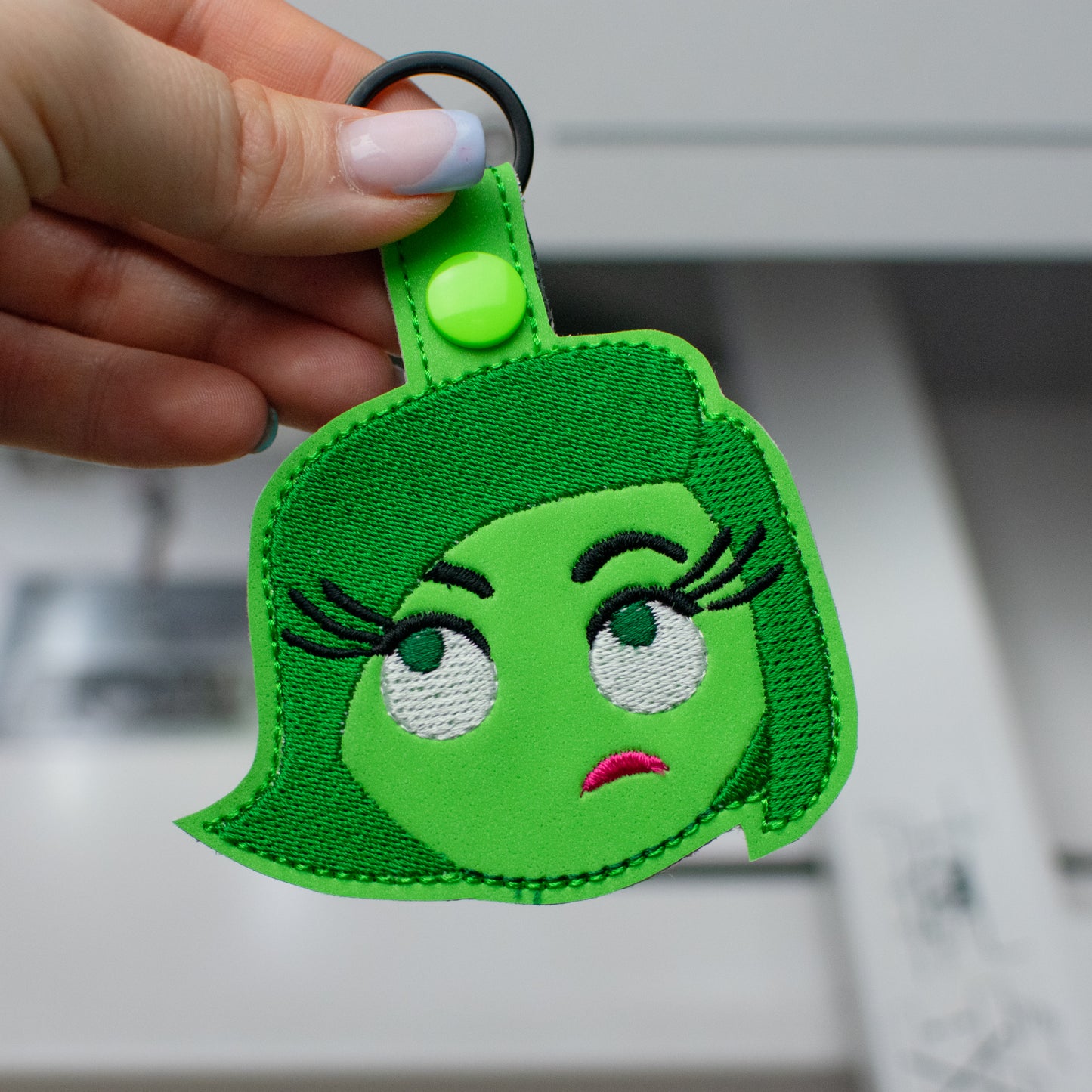 Green Emotion Keychain Embroidery Design